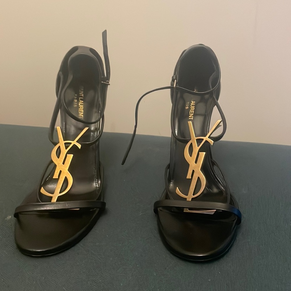 I am selling authentic YSL sandals. They have light wear (worn 5 times)